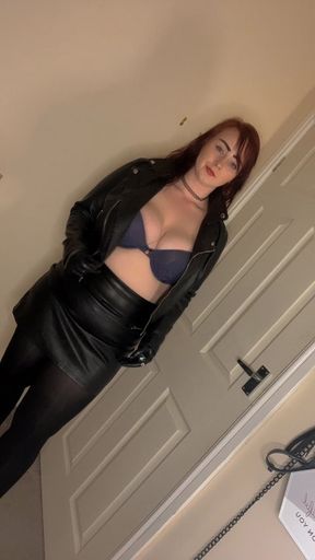 Smoking in my leather jacket, bra and skirt