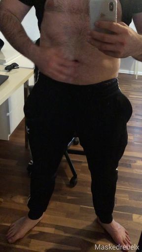 Sexy stud shows off his big soft cock before working out