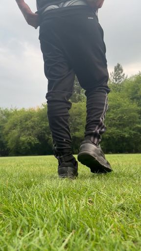 A twink boy showing dick in park