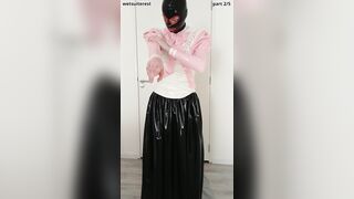 Putting on pinkish frilly spandex half-shirt over lengthy protection micro-skirt, maid pantyhose, undies, layers