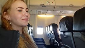 Airplane babe gives handjob and blowjob to willing pilot