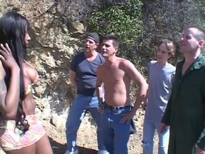 Black MILF with huge jugs runs into a horny group of guys and gets hardcorte gang bang
