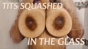 TITS SQUASHED IN THE GLASS