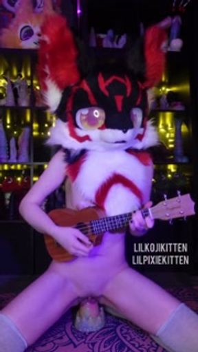 Sibging and playing Fireflies by Owl City while riding a dildo