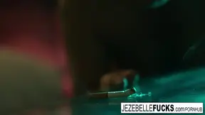 Tattooed MILF Jezebelle toys her pussy in a hotel room