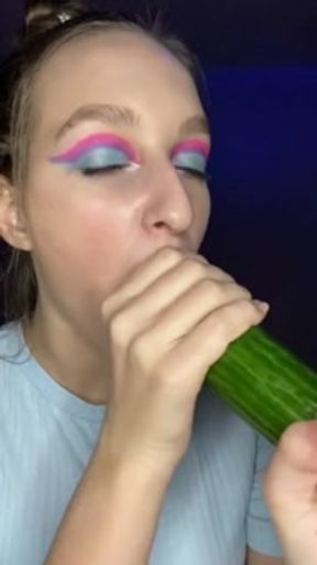 Testing little mouth with a huge cucumber. Drool, deep throat.