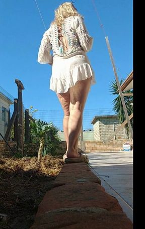 My Stepmom Showing off in the Garden Without Panties