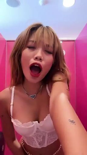 Emma Thai Fucking Herself with Fingers in Airport Toilet