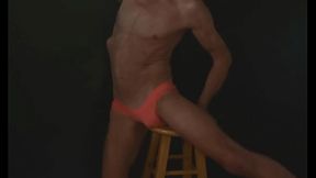 Part 2 - Down in the Dark - sneak a peek preview - Groin Stretching on the Stool with Dark Background and Bright Briefs - with the light off