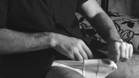 The Boy Jerks off Close-up with a Condom and Cums Loudly Into It.