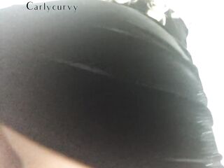 Blond Carlycurvy shows her curves in a short ebony suit!