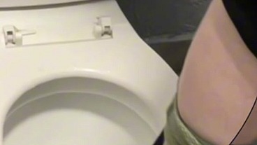 boy opens cubicle and catch his friend peeing (in a club's public toilets)
