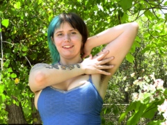 Blue Tipped Hair Girl Shows Tattoos and Armpits