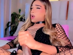 Horny sissy trap stroking her  big cock