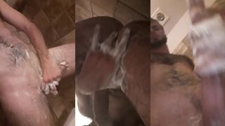 Watch Soapy Schlange get down and dirty with a big tattooed guy in a steamy shower
