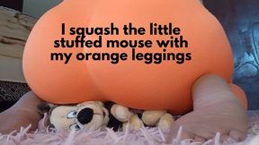 I squash the little stuffed mouse with my orange leggings
