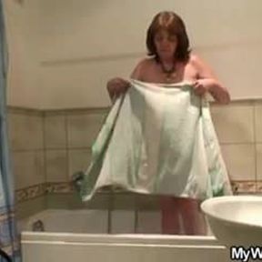 Horny son-in-law bangs busty granny after shower