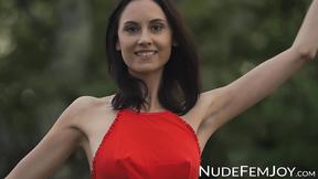 ”Joyful brunette outdoor muff teasing”