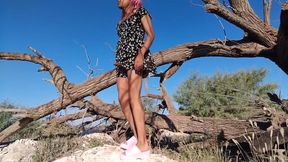 Femboy strips in public riding that log her slutty ass loves