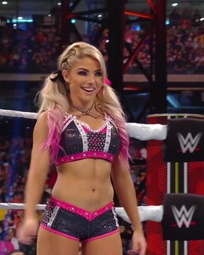 Pigtailed celebrity gets her big tits exposed in an intense ass wrestling match