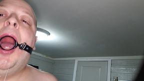Deepthroating a 7 Inch Dildo with Mouth Gag Ring