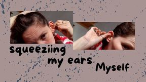 squeezing my ears myself