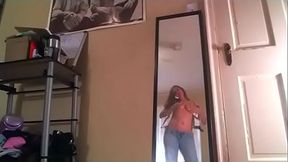A chubby beauty masturbates her pussy and pees in her pants