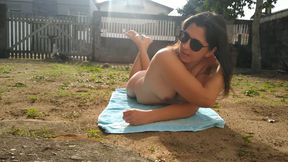 Wife sunbathing naked in front yard