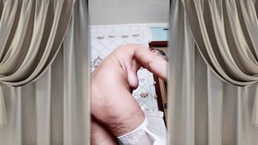 Hot housewife Lukerya flirts in an open transparent white jumpsuit in the kitchen 2