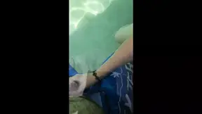 Giving the poolboy a handjob