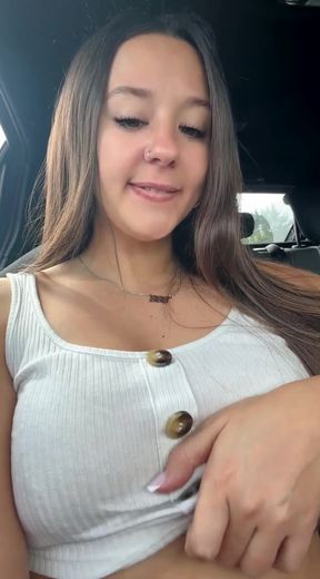 Tiny teen shows off her big tits