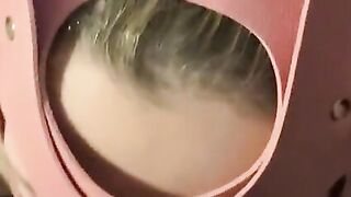 cum on the face of a pink kitty inside handcuffs