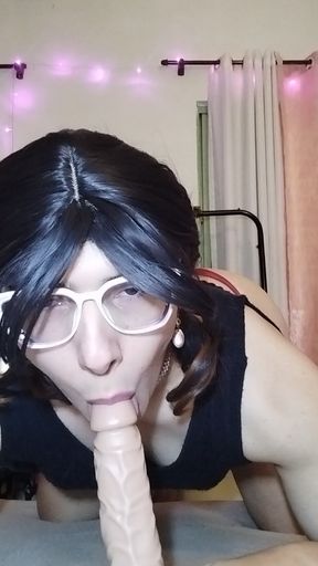 Trans with toy and cage in a chastity