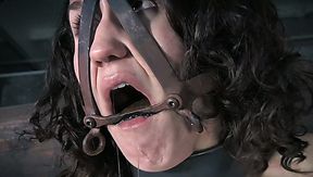 Chained dark haired bitch with tiny tits Bonnie Day gets whipped hard