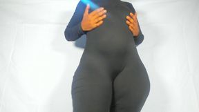 Hourglass-shaped big ass mistress in tight jumpsuit dominates and controls