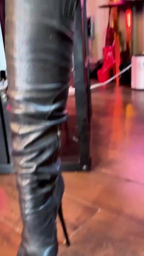 Woman with boots gives sultry footjob