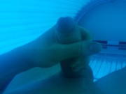 Boy masturbating in solarium