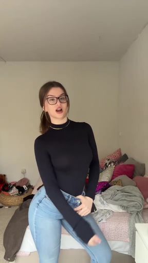Woman in black turtleneck posing