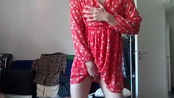 Crossdresser secretary in a cute flower dress for summer