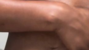 Nude Ebony belly button tease with oil