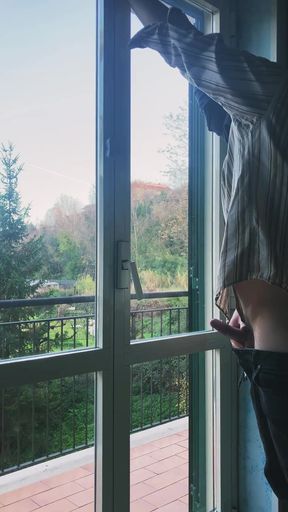 I masturbate in front of the window hoping someone will see me