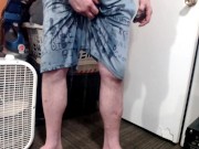 standing pissing in under armour shorts