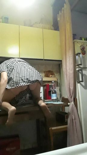 Housewife in the Kitchen with Brush in Pussy