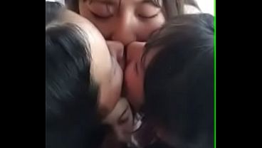 Lesbian Asian girlfriends enjoy a hot kissing party at the hotel