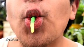 eating worm gummies in my garden