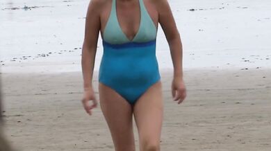 Latina mom shows off, masturbates and fucks on the beach