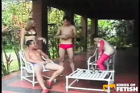 Two guys rough up their slutty girlfriends' asses outside