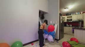 Akina pops her balloons