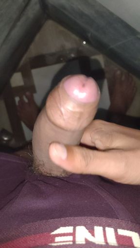 Man masturbating in bathroom