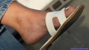 Foot and shoe fetish admiration, dirty feet and slippers dangling close-up